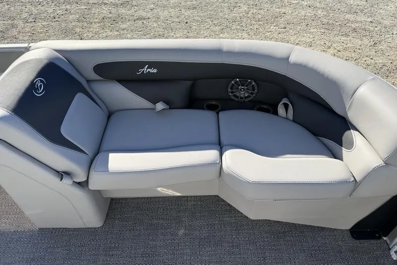Slide: The Image of Luxurious seating on 2025 Barletta A20UC boat, featuring comfortable gray upholstery and cup holders. - 4