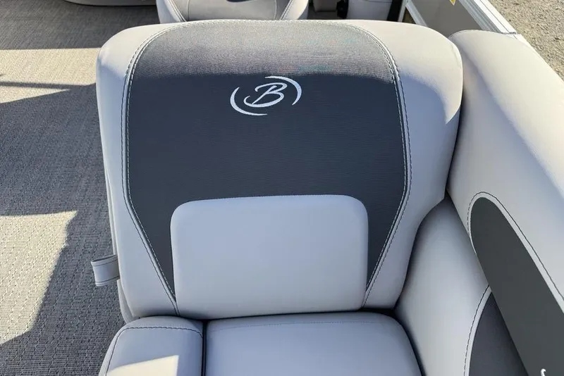 Slide: The Image of 2025 Barletta A20UC boat seat with logo, featuring gray and white upholstery. - 7