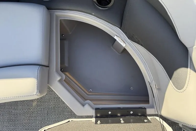 Slide: The Image of Interior storage compartment of 2025 Barletta A20UC boat with gray seating. - 8