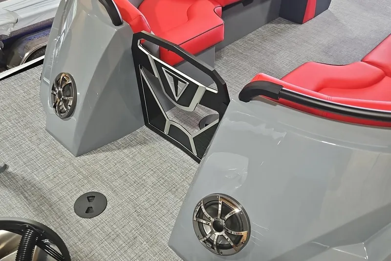 Slide: The Image of 2025 Trifecta Sport RF9 DC boat interior with red seating and modern speaker system. - 5