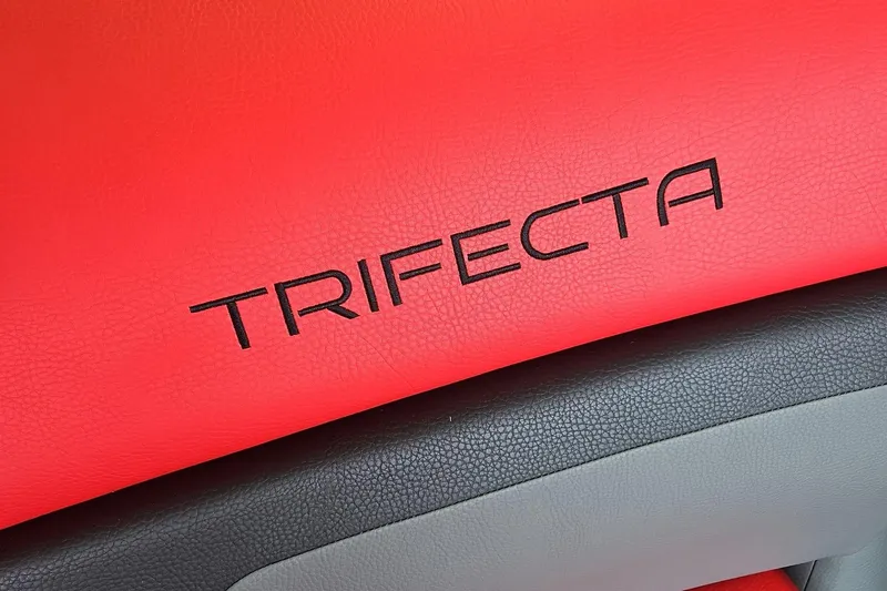 Slide: The Image of Red and black Trifecta Sport RF9 DC 2025 car interior detail. - 8