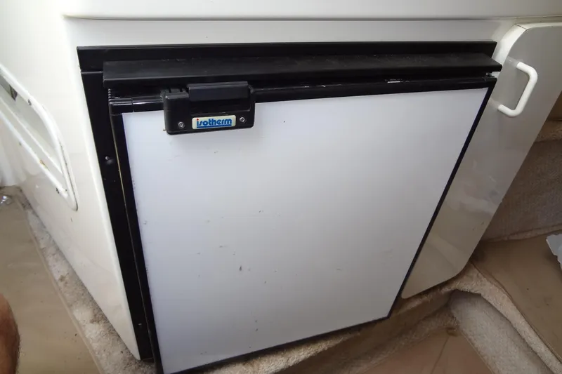Slide: The Image of Isotherm refrigerator on 2000 Chaparral Signature 260 boat interior. - 25
