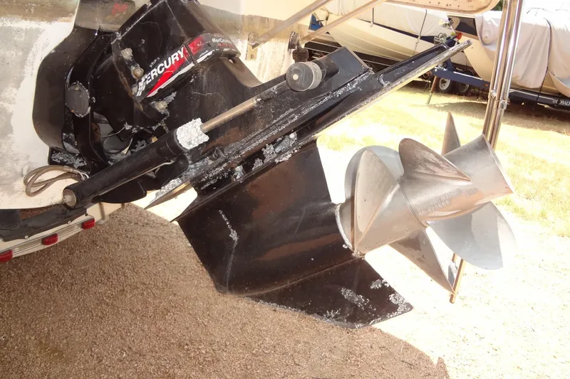 Slide: The Image of Rear view of 2000 Chaparral Signature 260 boat with Mercury outdrive and propeller. - 32