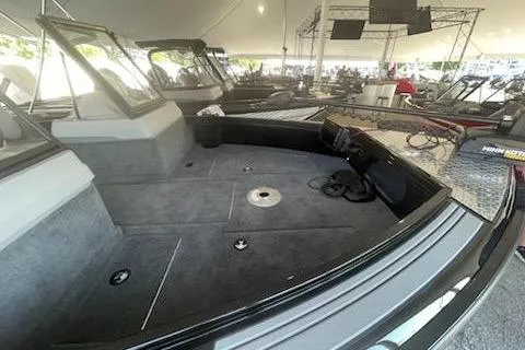 Slide: The Image of 2026 Smoker Craft 210 GLS Sport boat interior at a showroom display. - 5