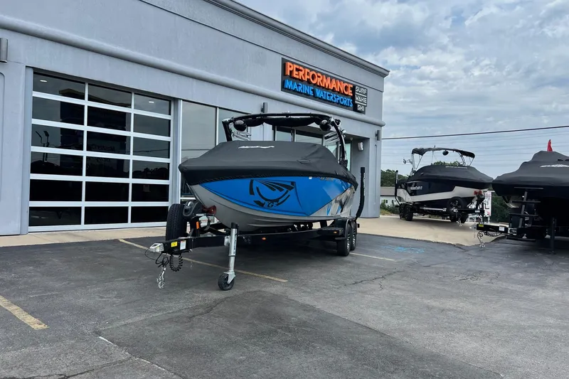 Slide: The Image of 2016 Tigé Z1 boat with cover at Performance Marine Watersports dealership. - 15