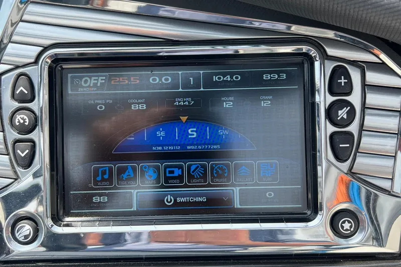 Slide: The Image of Dashboard display of a 2016 Tigé Z1 boat showing various controls and settings. - 17
