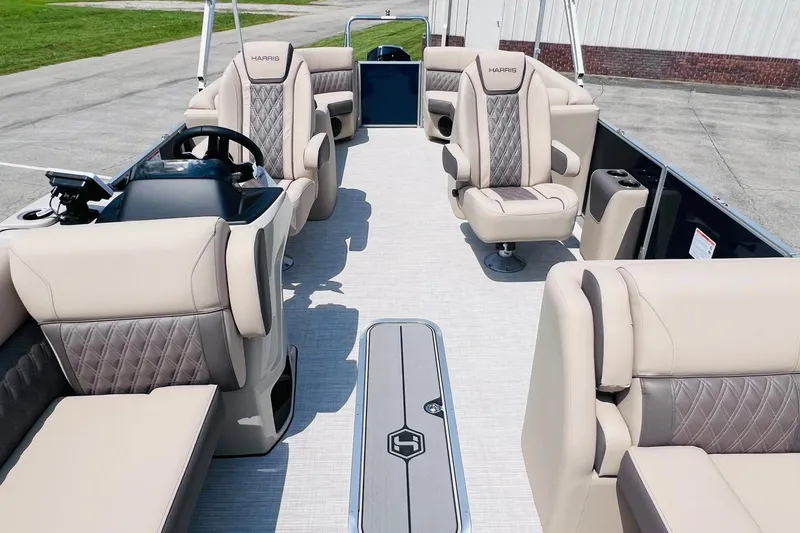 Slide: The Image of Luxurious 2026 Harris Cruiser Sunliner 250 CW boat interior with plush seating and modern design. - 12