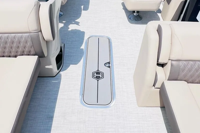 Slide: The Image of Luxurious interior of 2026 Harris Cruiser Sunliner 250 CW boat, featuring elegant seating and flooring. - 15