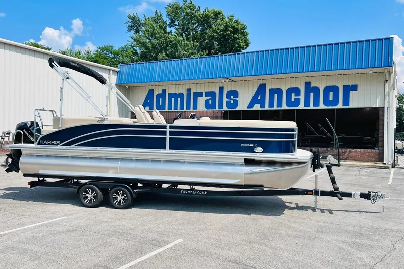 Slide: The Image of 2026 Harris Cruiser Sunliner 250 CW 200HP pontoon boat on trailer at Admirals Anchor. - 2