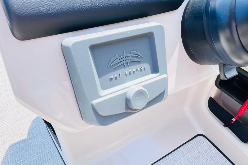 Slide: The Image of Wet Sounds audio system on 2026 Harris Cruiser Sunliner 250 CW boat dashboard. - 22