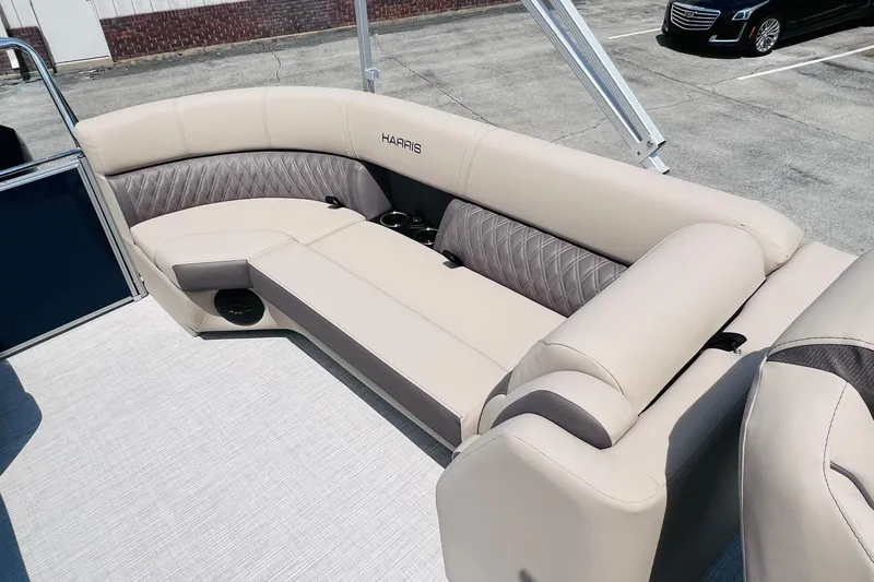 Slide: The Image of Luxurious seating on 2026 Harris Cruiser Sunliner 250 CW boat, featuring elegant beige upholstery. - 28