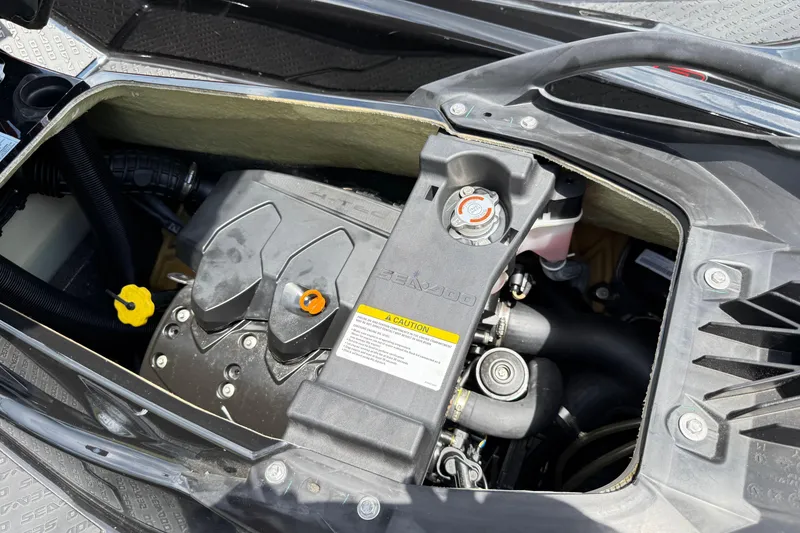 Slide: The Image of 2014 Sea-Doo RXT-X 260 engine compartment, showcasing internal components and design. - 11