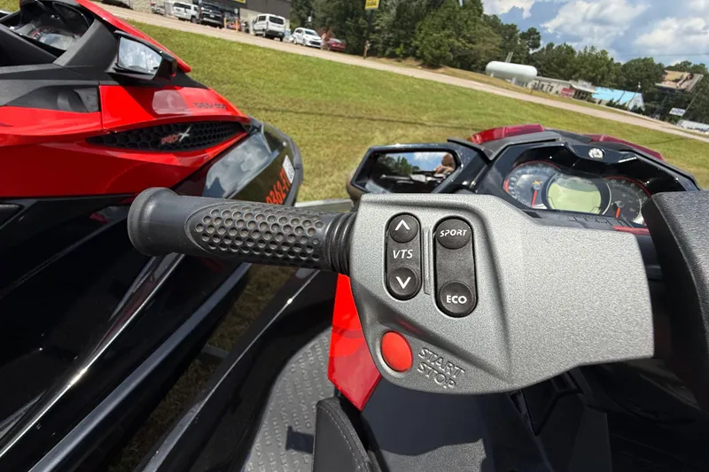 Slide: The Image of 2014 Sea-Doo RXT-X 260 handlebar controls with VTS, Sport, and Eco buttons. - 19