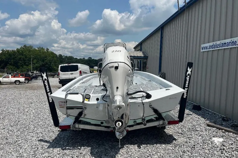 Slide: The Image of 2026 Xpress H20 BAY boat on trailer, parked outside Andalusia Marine. - 3