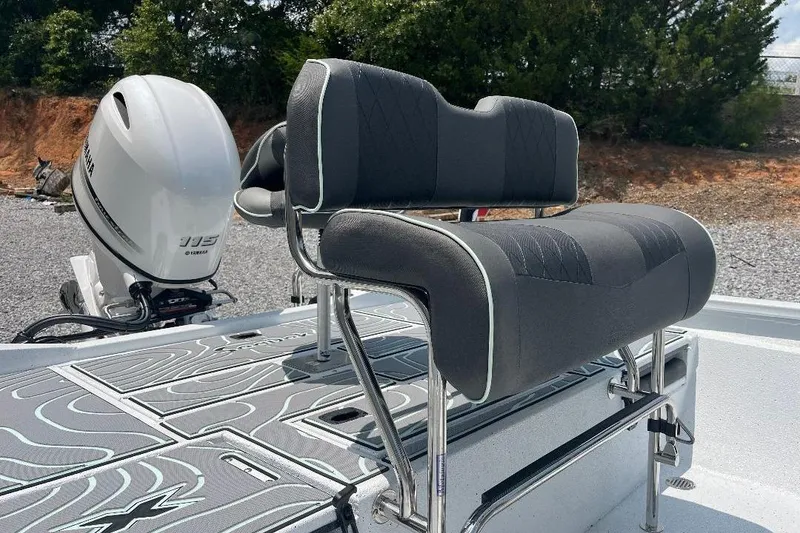 Slide: The Image of 2026 Xpress H20 BAY boat with dual seats and Yamaha outboard motor. - 8