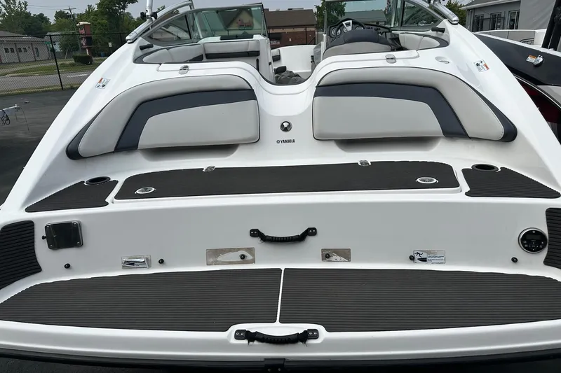 Slide: The Image of 2015 Yamaha Boats AR210 rear view with seating and swim platform. - 6
