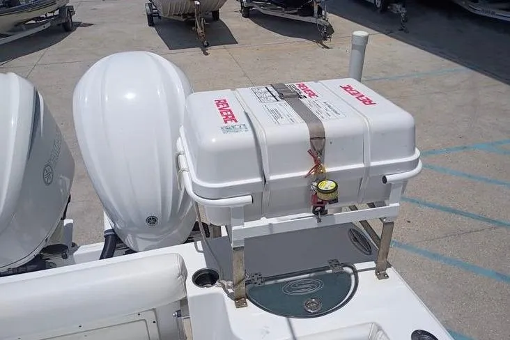 Slide: The Image of 2021 Sportsman Open 282 Center Console dashboard with dual screens and steering wheel. - 7