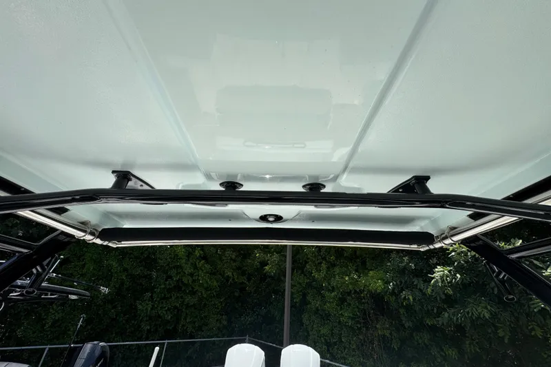 Slide: The Image of 2021 Robalo R317 Dual Console boat roof and frame detail. - 25