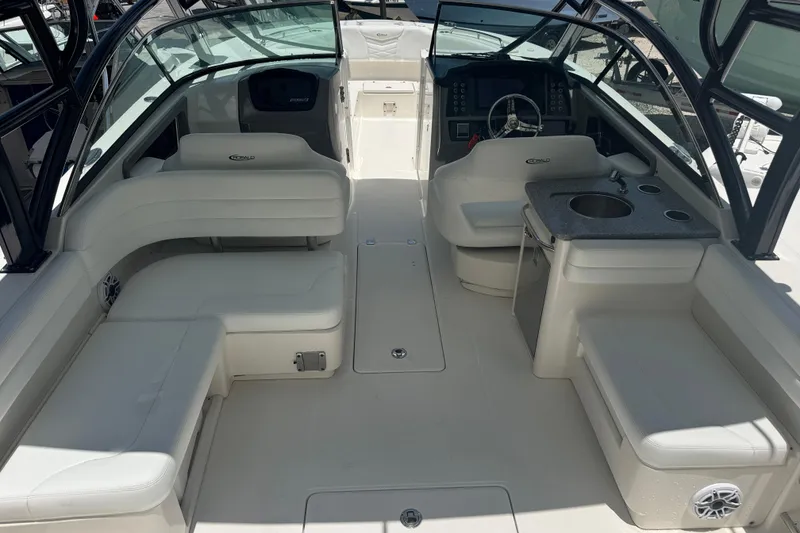 Slide: The Image of 2021 Robalo R317 Dual Console boat interior with seating and helm. - 3