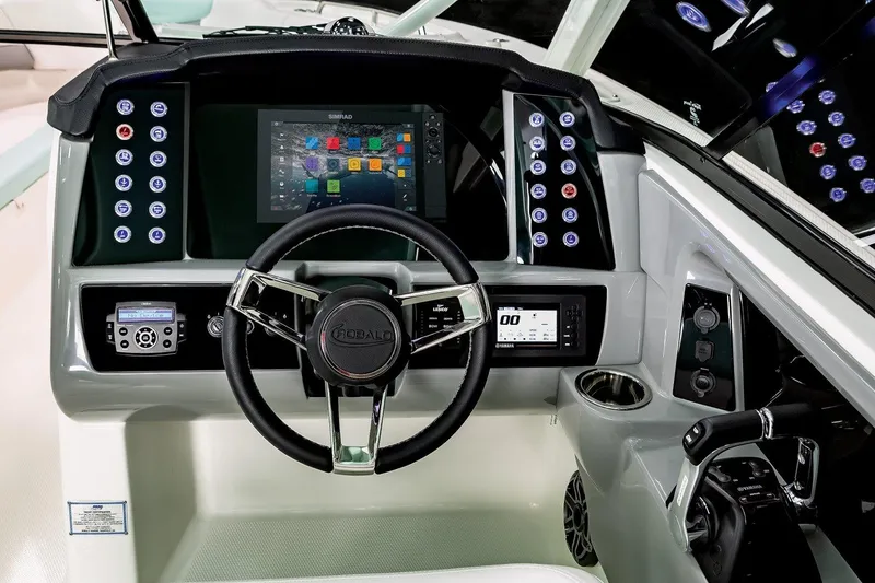 Slide: The Image of Manufacturer Provided Image: 2021 Robalo R317 Dual Console boat dashboard with modern controls and touchscreen display. - 34
