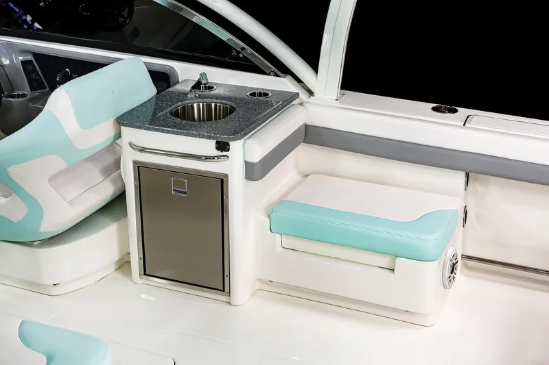 Slide: The Image of Manufacturer Provided Image: 2021 Robalo R317 Dual Console boat interior with sink and seating. - 36