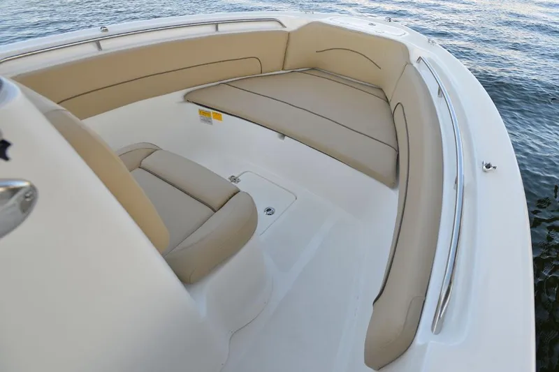 Slide: The Image of Manufacturer Provided Image: 2020 NauticStar 20 XS Offshore boat with beige seating in bow area. - 14