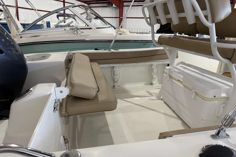Slide: The Image of 2020 NauticStar 20 XS Offshore boat interior with seating and storage. - 5
