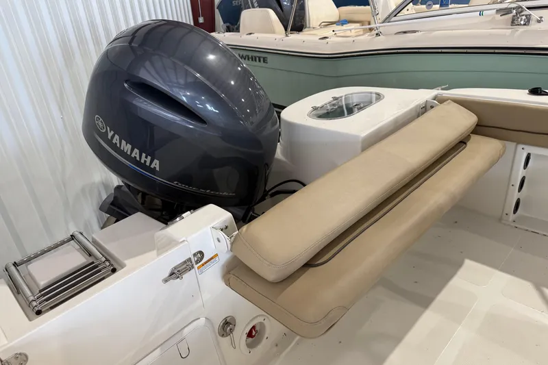 Slide: The Image of 2020 NauticStar 20 XS Offshore boat with Yamaha outboard motor and beige seating. - 8