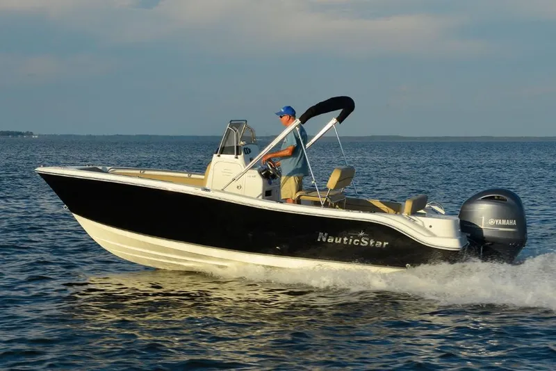 Slide: The Image of Manufacturer Provided Image: 2020 NauticStar 20 XS Offshore boat cruising on open water. - 9
