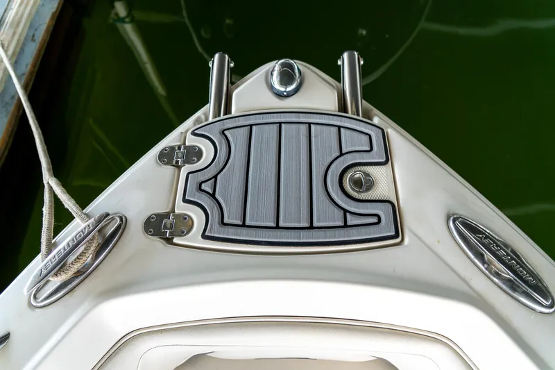 Slide: The Image of Bow of 2013 Monterey 204FS boat with anchor locker and cleat. - 16
