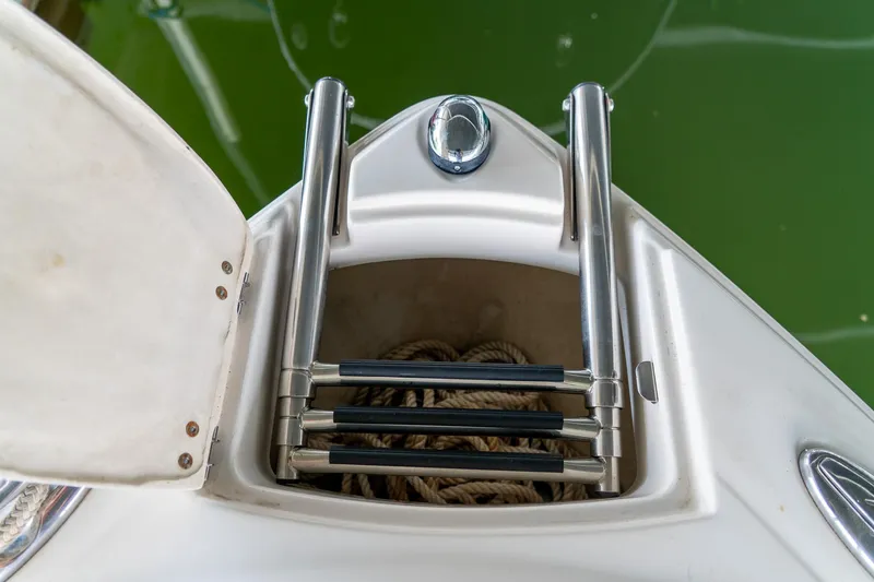 Slide: The Image of Stainless steel boat ladder on 2013 Monterey 204FS, with storage compartment and rope. - 17