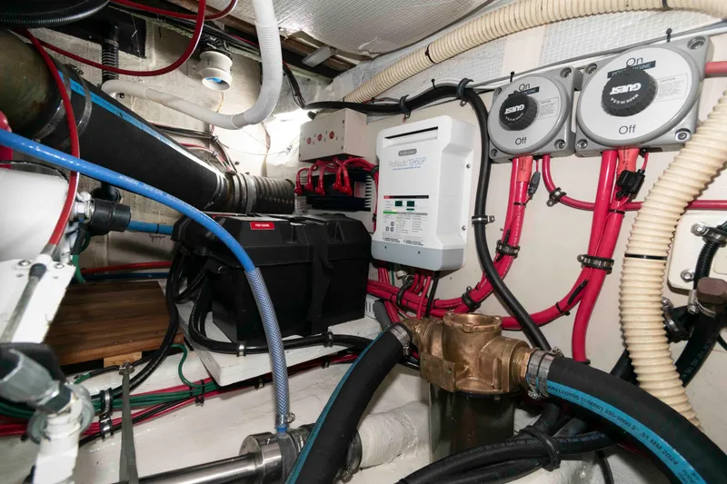 Slide: The Image of Engine room of 1998 Sabre 36 Hardtop Express with wiring and equipment. - 33