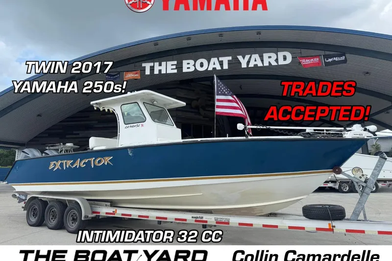 Slide: The Image of 2005 INTIMIDATOR 32 CC boat with twin 2017 Yamaha 250s at The Boat Yard. - 1