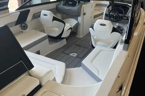 Slide: The Image of 2025 Chaparral 23 Surf boat interior with modern seating and sleek design. - 5