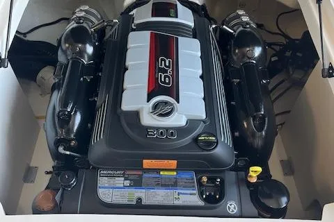 Slide: The Image of 2025 Chaparral 23 Surf boat engine, featuring a powerful 6.2L Mercury motor. - 7