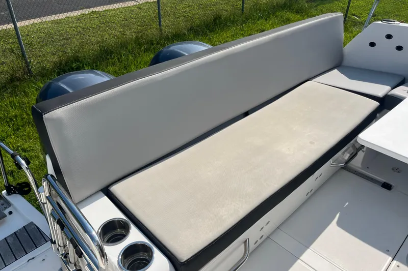 Slide: The Image of Jeanneau NC 895 boat seating area with cup holders, 2020 model. - 12