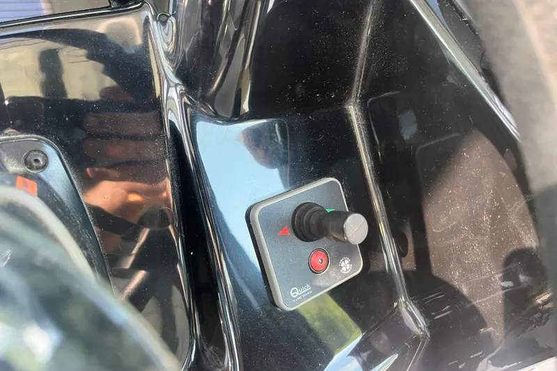 Slide: The Image of Control panel of a 2020 Jeanneau NC 895 boat with joystick and buttons. - 23