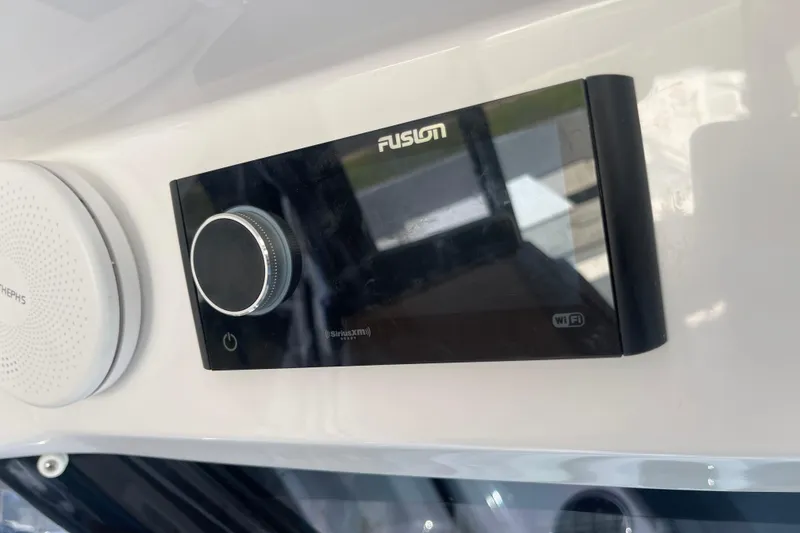 Slide: The Image of Fusion stereo system on 2020 Jeanneau NC 895 boat dashboard. - 33