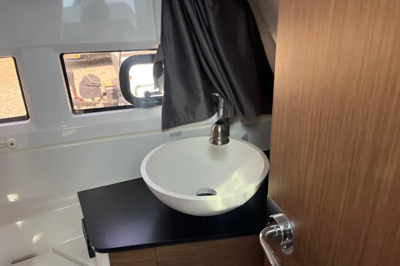 Slide: The Image of Interior of 2020 Jeanneau NC 895 boat featuring a modern bathroom sink. - 37