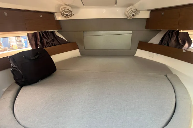 Slide: The Image of Interior cabin of 2020 Jeanneau NC 895 with cozy bed and storage. - 38