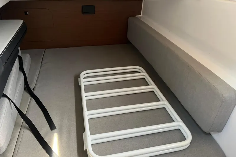 Slide: The Image of Interior of 2020 Jeanneau NC 895 boat with seating and storage area. - 43