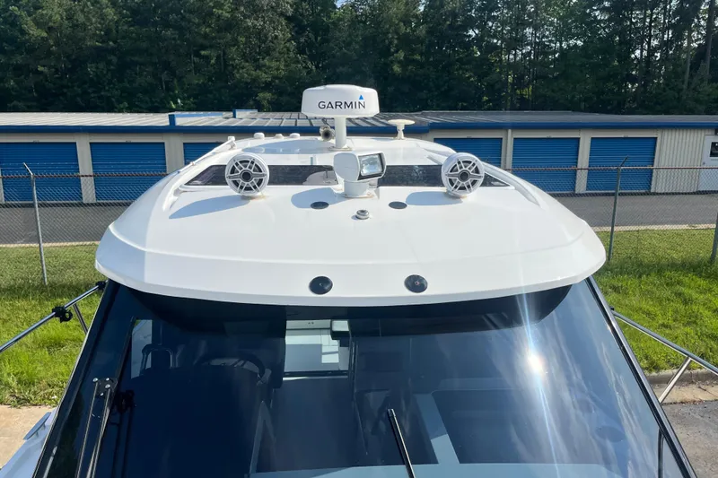 Slide: The Image of 2020 Jeanneau NC 895 boat with Garmin radar and speakers on the roof. - 50