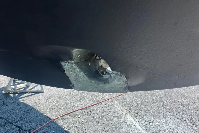 Slide: The Image of Damaged hull of 2020 Jeanneau NC 895 boat on dry dock. - 6