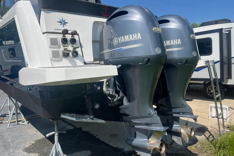 Slide: The Image of 2020 Jeanneau NC 895 boat with dual Yamaha 200 outboard engines. - 8