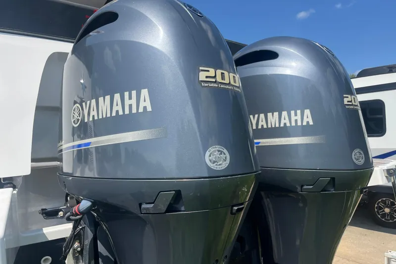 Slide: The Image of Twin Yamaha 200 outboard engines on a 2020 Jeanneau NC 895 boat. - 9