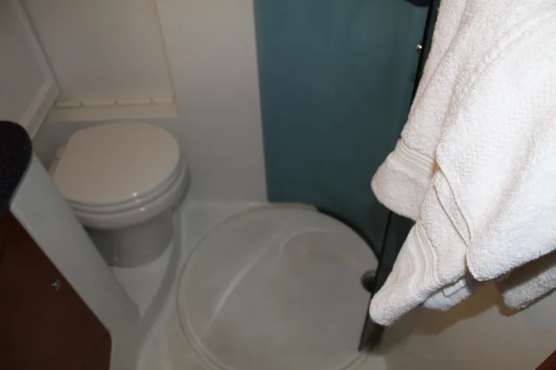 Slide: The Image of Bathroom interior of 2005 Beneteau Antares 13.80 yacht with shower and toilet. - 28