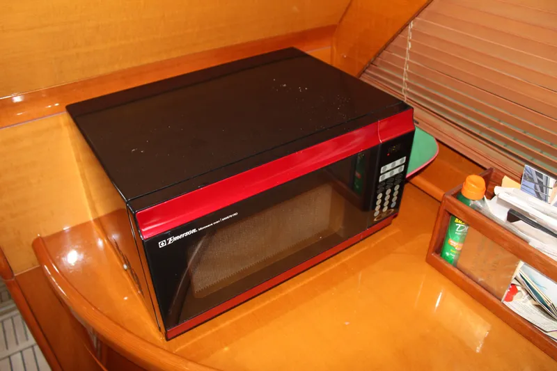Slide: The Image of Microwave in the galley of a 2005 Beneteau Antares 13.80 boat. - 33
