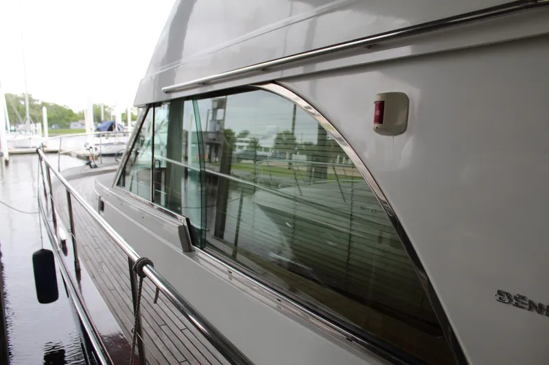 Slide: The Image of Side view of 2005 Beneteau Antares 13.80 yacht docked at marina. - 5