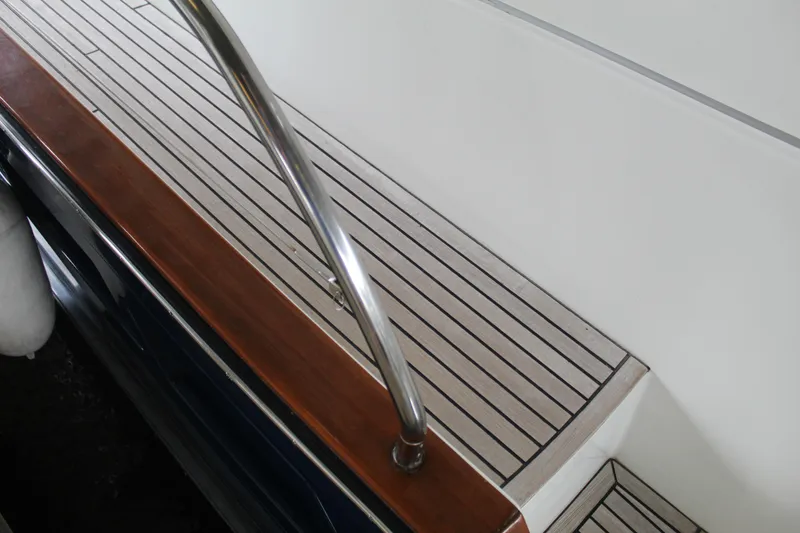 Slide: The Image of Teak deck and stainless steel railing on a 2005 Beneteau Antares 13.80 yacht. - 7