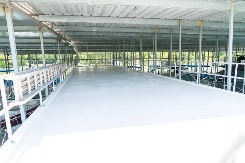 Slide: The Image of Rooftop deck of 1995 Lakeview 62 x 14 Widebody Houseboat under covered marina. - 51